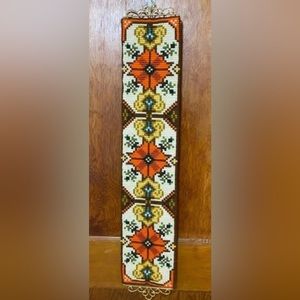 Vintage needlepoint bell pull with brass hardware
